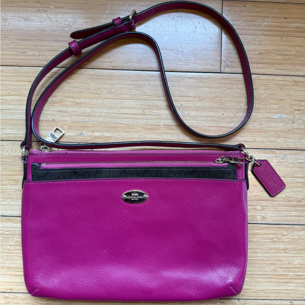 Coach Pink Crossbody Bag with Adjustable Strap and Silver Hardware
